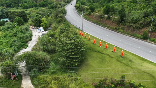 Road Curve With Monk Statues