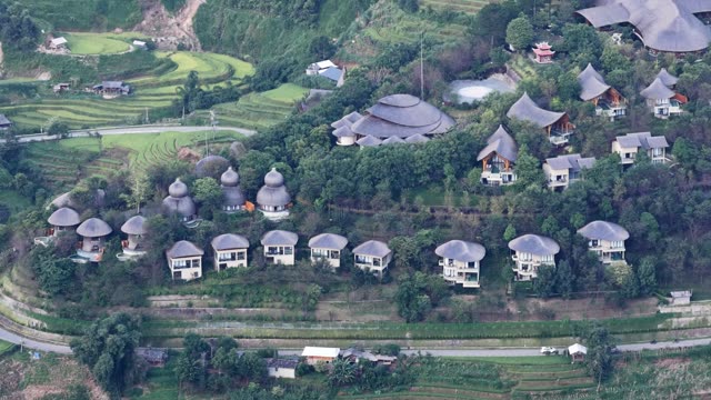 Thatched Resort Among Rice Terraces