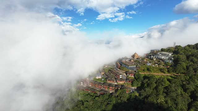 Hillside Village Wreathed In Cloud