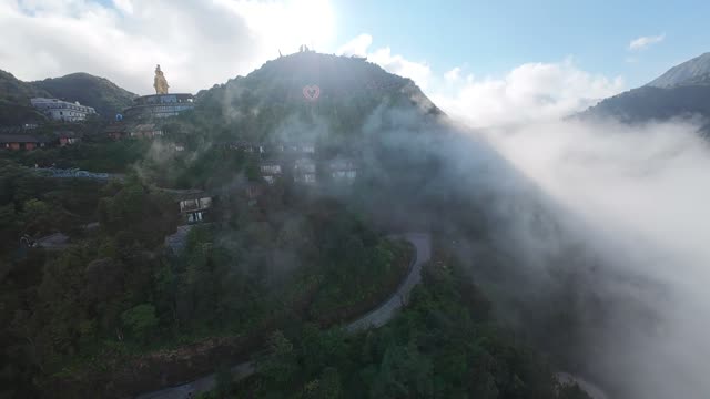 Cloud-Wrapped Mountain Peak