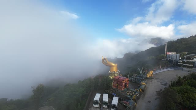 Golden Hand Viewpoint In Clouds
