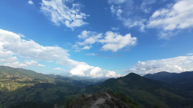 Clouds Over Layered Mountains