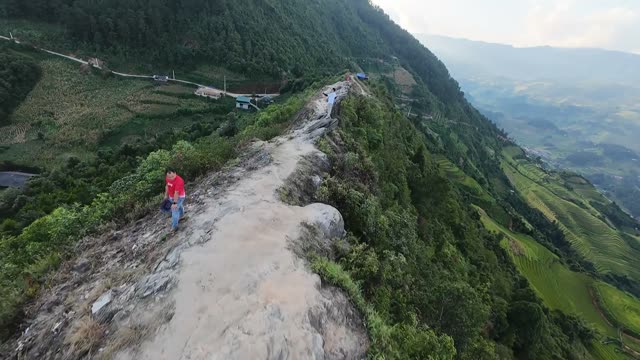 Hiker On A Mountain Rock Ridge
