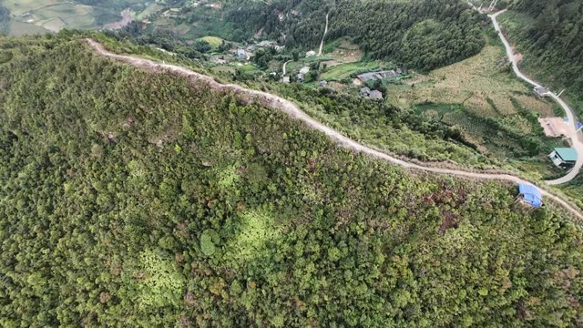 Winding Road To A Hill Village