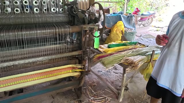 Weaving A Sedge Mat On A Loom