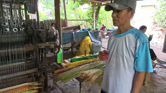 Weaving A Sedge Mat On A Loom