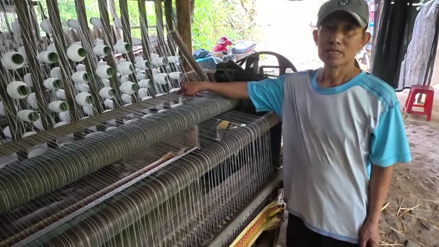 Weaving A Sedge Mat On A Loom