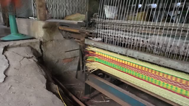 Weaving A Sedge Mat On A Loom