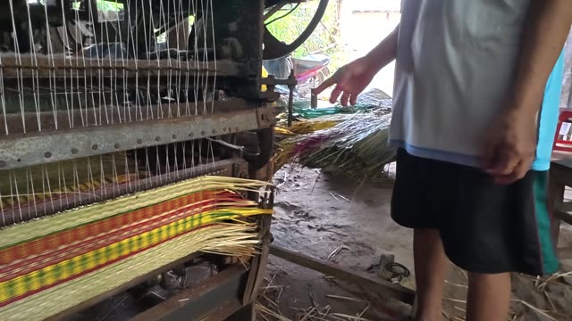 Weaving A Sedge Mat On A Loom
