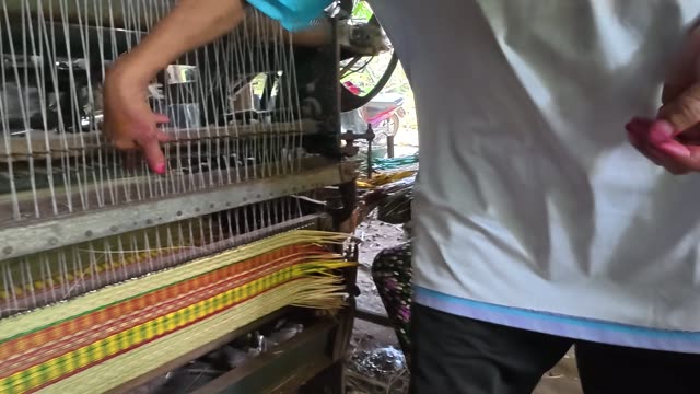 Weaving A Sedge Mat On A Loom