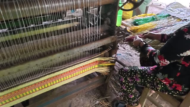 Weaving A Sedge Mat On A Loom