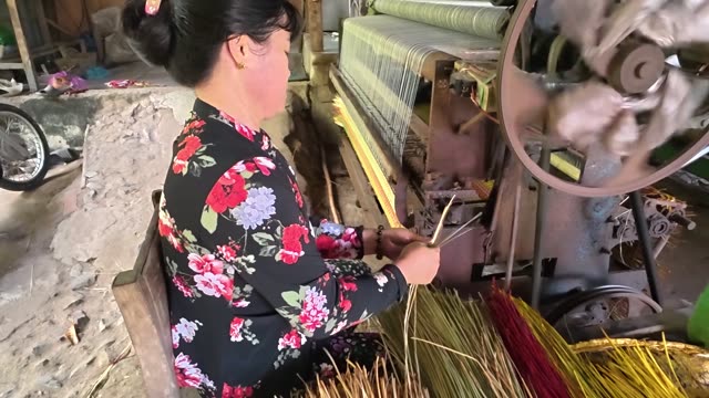 Weaving A Sedge Mat On A Loom