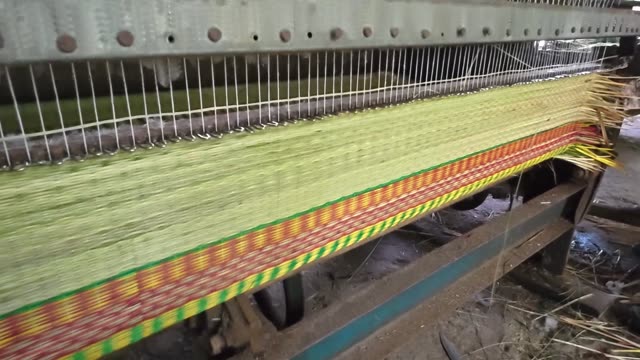 Weaving A Sedge Mat On A Loom