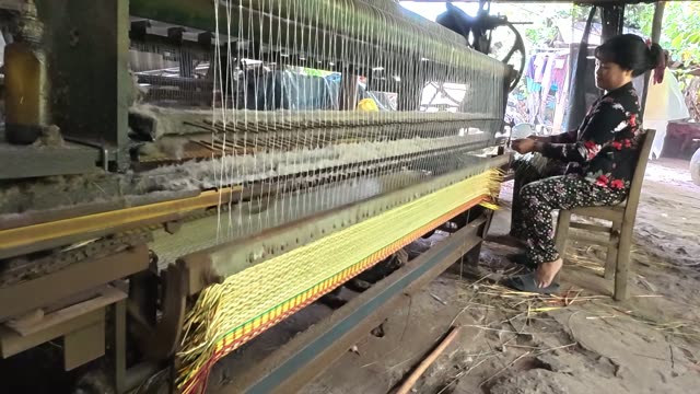 Weaving A Sedge Mat On A Loom