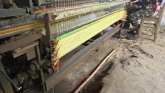 Weaving A Sedge Mat On A Loom
