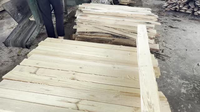 Freshly Sawn Planks On Ground