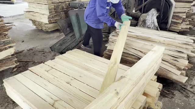 Sorting Pale Timber Planks