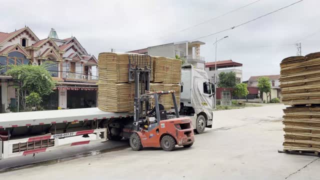 Forklift Loading Veneer Onto Truck