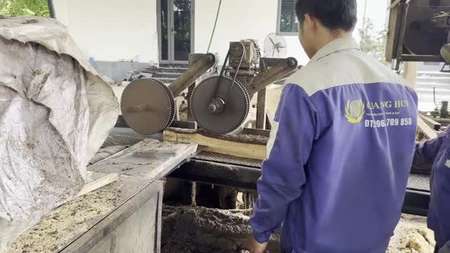 Sawmill Worker In Blue Jacket