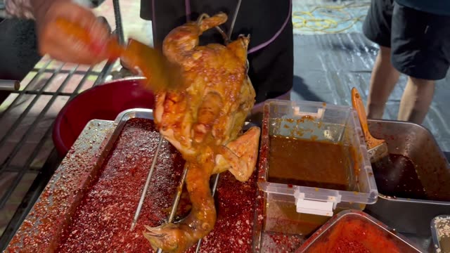 Brushing Chili On Chicken