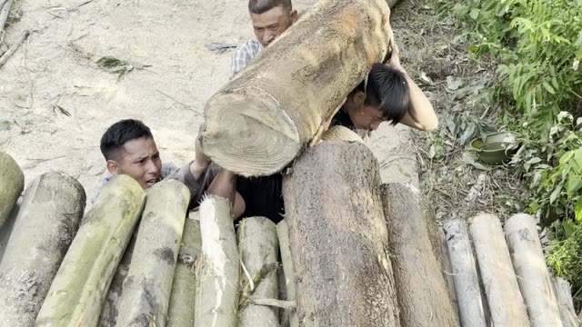 Lifting A Heavy Log