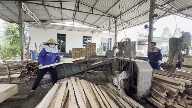 Workers At Village Sawmill