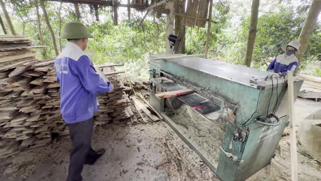 Carrying Planks At Resaw Machine