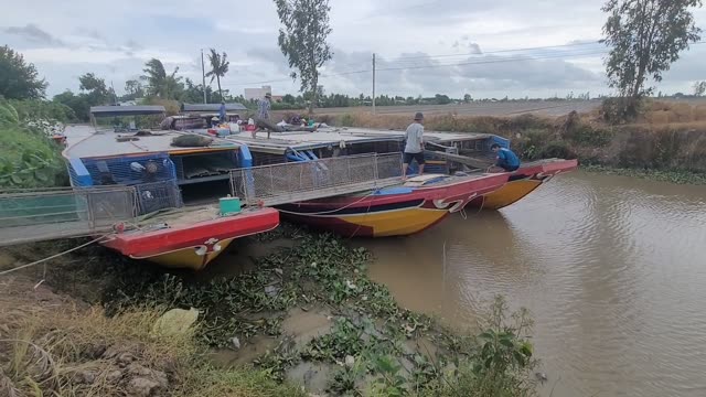 Boats On A Rural River
